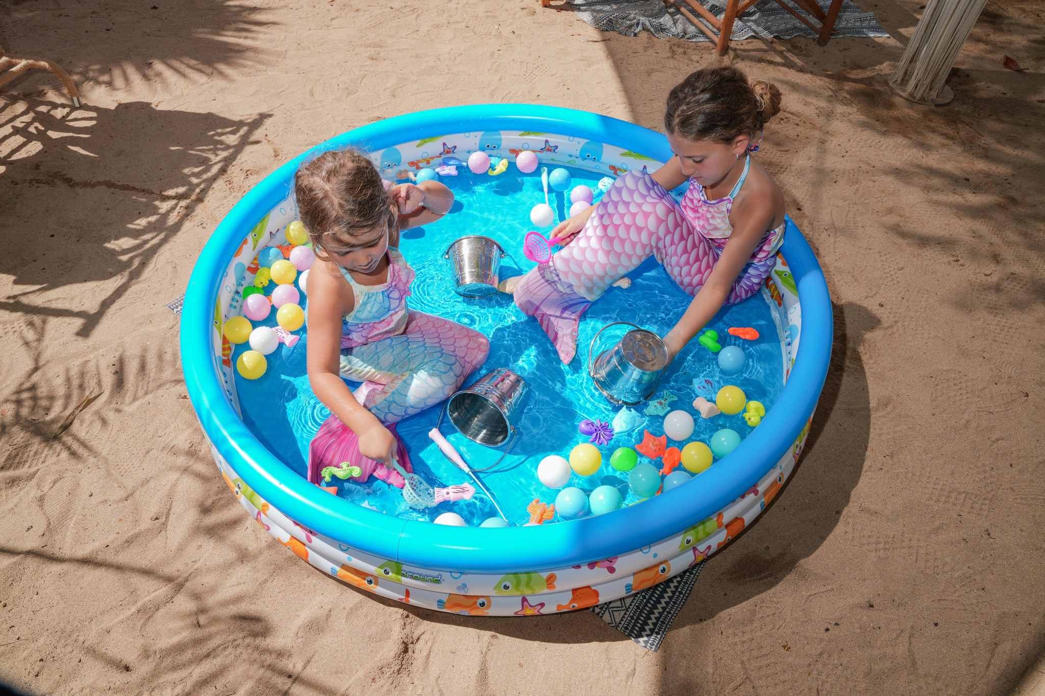 Children in an inflatable pool at Le Petit Corners, Le Bleu by K Club, Nusa Dua